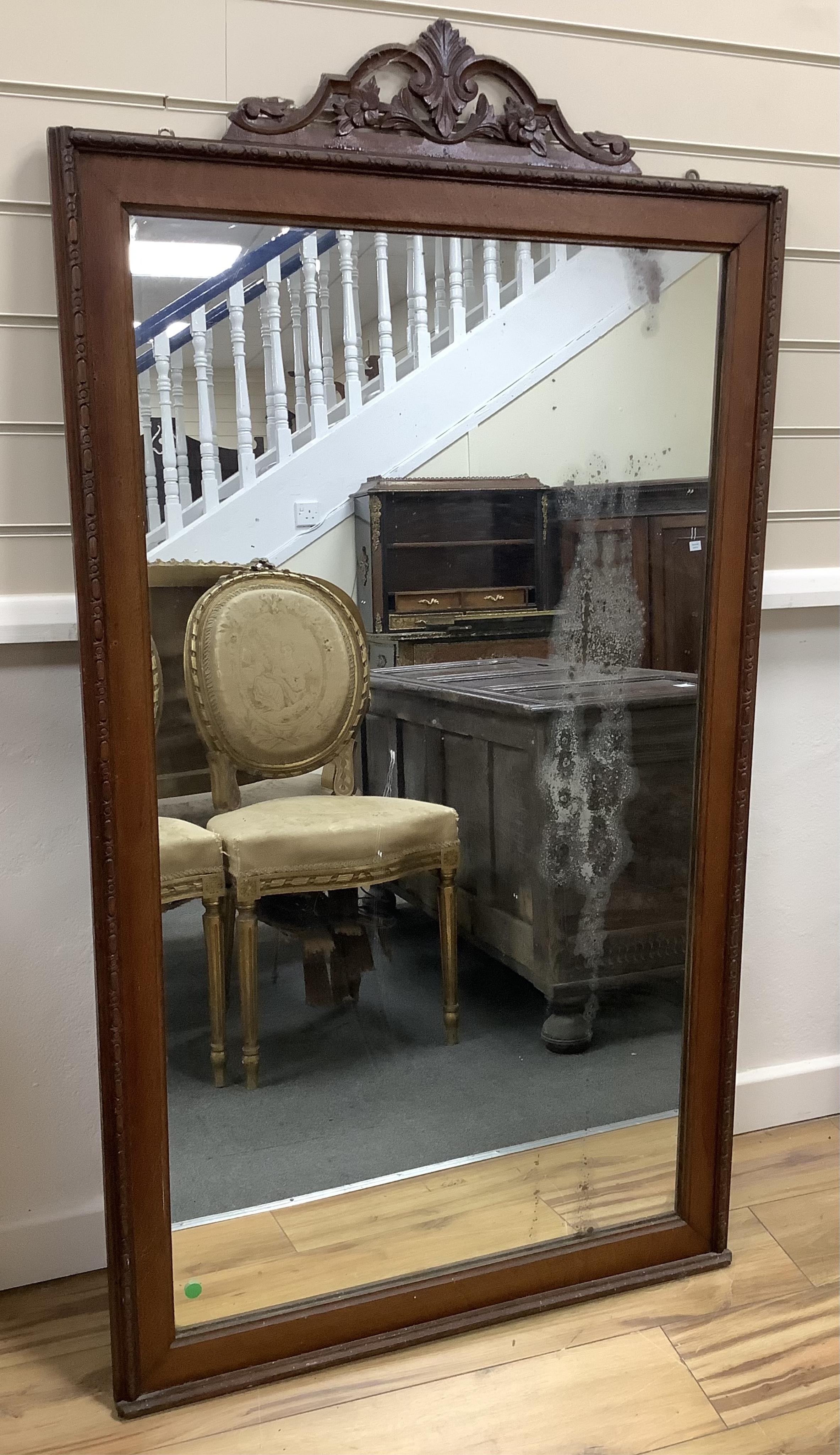 A late 19th century French oak overmantel mirror, width 79cm, height 146cm. Condition fair.